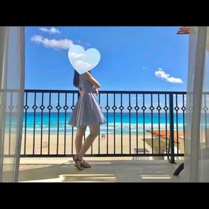 This is a perfect blue dress for vacation.